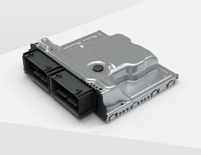 Silver and black electronic control module with connectors on the side.