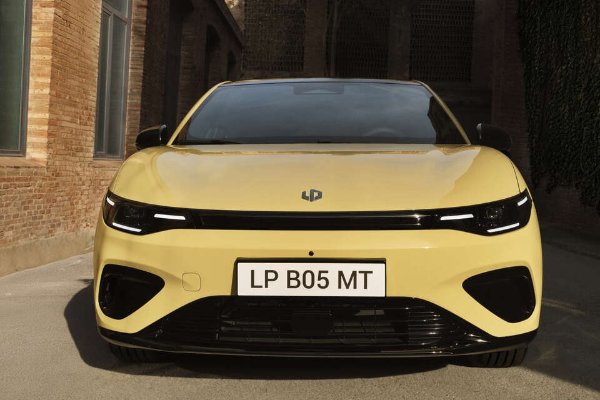 Yellow car with a LP B05 MT number plate, viewed from the front.