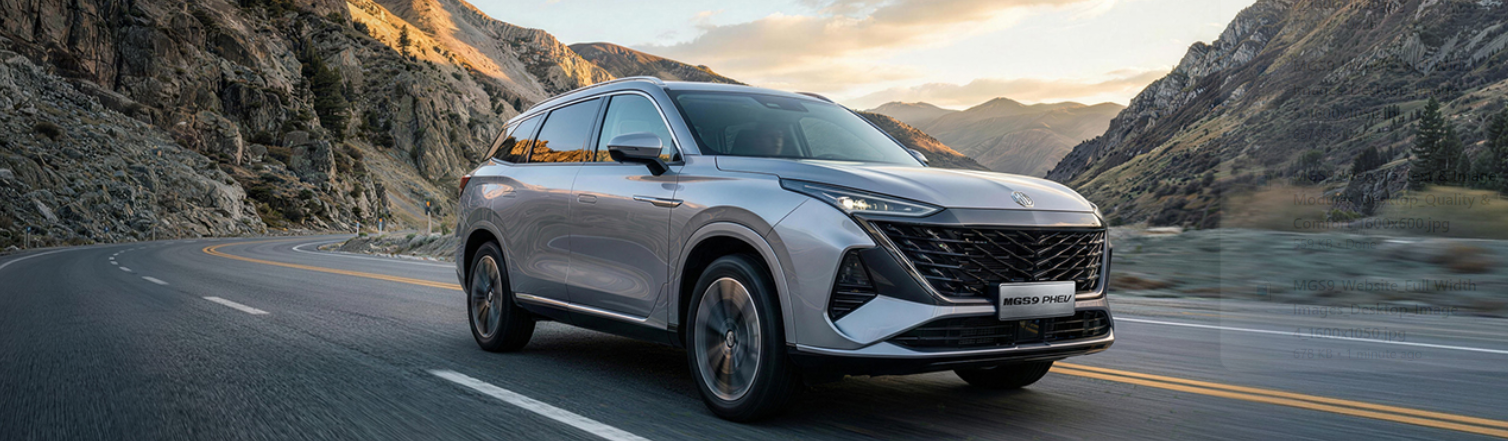 Silver SUV driving on a mountain road.