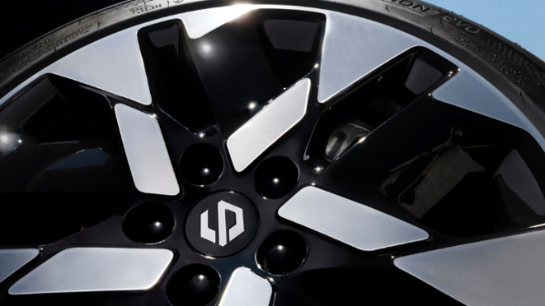 Close-up of a modern car alloy wheel with geometric design and Hankook tyre.