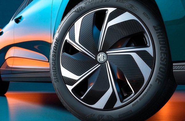 Close-up of a car wheel with MG logo and Bridgestone tyre.